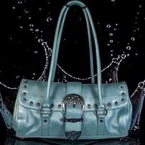 Prague Pearlized East west Pebble leather Handbag.